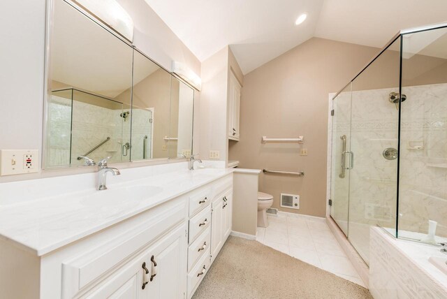 N19W22081 Fox View Ct Unit 2B, Waukesha, WI 53186 - full bath with double vanity, a stall shower, toilet, lofted ceiling, and tile patterned flooring