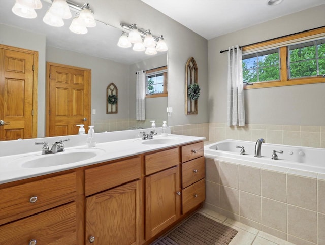 5605 N Mcnichols Dr, Milton, WI 53563 - full bath with double vanity, tile patterned floors, and a bath