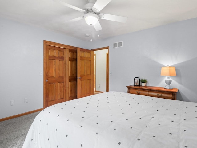 5605 N Mcnichols Dr, Milton, WI 53563 - carpeted bedroom with baseboards, ceiling fan, and a closet
