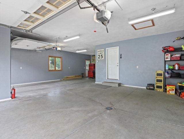 5605 N Mcnichols Dr, Milton, WI 53563 - garage featuring a garage door opener