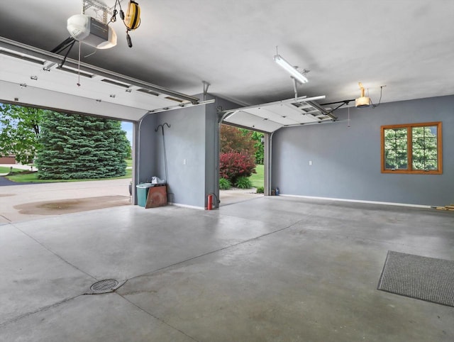 5605 N Mcnichols Dr, Milton, WI 53563 - garage featuring a garage door opener