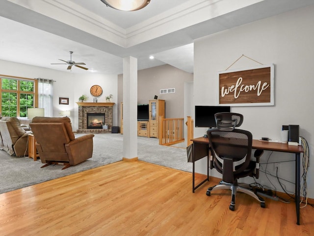 5605 N Mcnichols Dr, Milton, WI 53563 - office area featuring a brick fireplace, wood finished floors, ceiling fan, and baseboards
