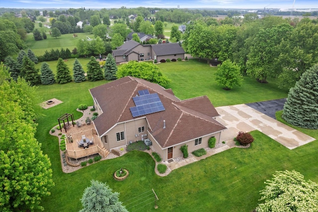 5605 N Mcnichols Dr, Milton, WI 53563 - view of subject property with a tree filled landscape
