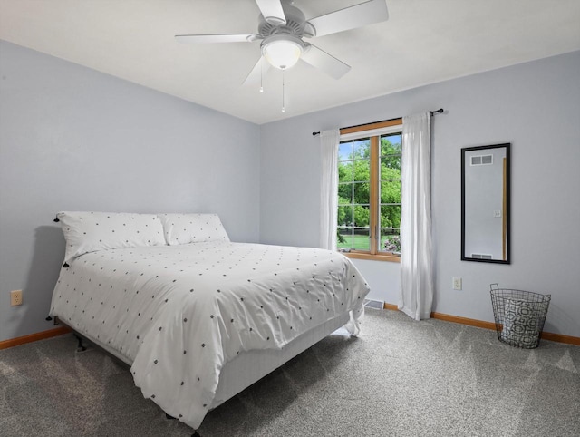 5605 N Mcnichols Dr, Milton, WI 53563 - carpeted bedroom featuring baseboards and ceiling fan