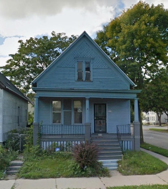 503 W Chambers St, Milwaukee, WI 53212 - view of front of house featuring a porch and stairs