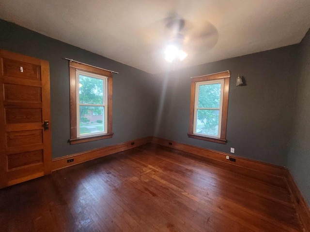 324 N Pine St, Reedsburg, WI 53959 - spare room featuring wood finished floors, baseboards, and a ceiling fan
