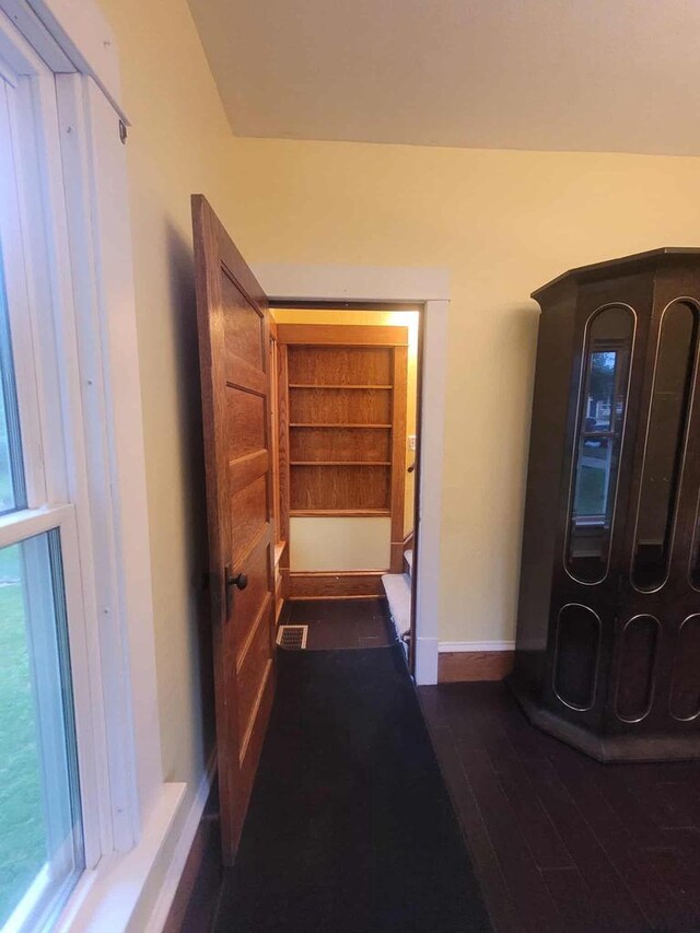 324 N Pine St, Reedsburg, WI 53959 - hallway with baseboards and dark wood-style floors