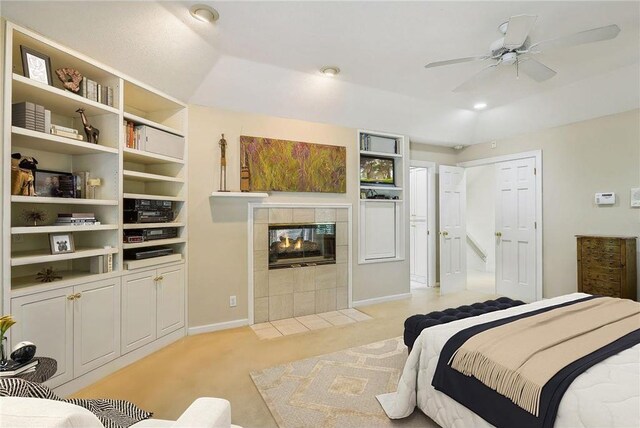 689 Brookside Ln, Mendota Heights, MN 55118 - bedroom with light colored carpet, a tiled fireplace, baseboards, and recessed lighting
