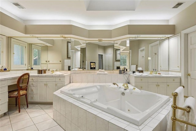 689 Brookside Ln, Mendota Heights, MN 55118 - full bathroom with a whirlpool tub, vanity, tile patterned floors, and plenty of natural light