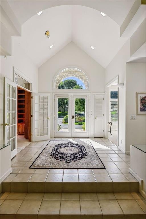689 Brookside Ln, Mendota Heights, MN 55118 - tiled entryway with french doors, high vaulted ceiling, plenty of natural light, and recessed lighting