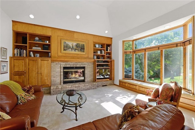 689 Brookside Ln, Mendota Heights, MN 55118 - carpeted living area with built in features, recessed lighting, a brick fireplace, and high vaulted ceiling