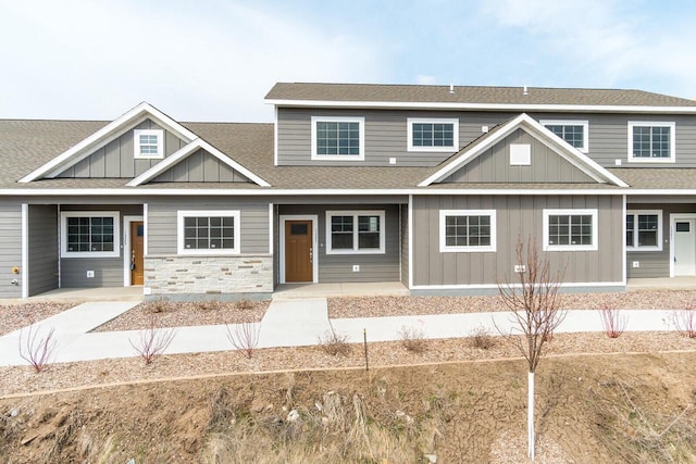 1325 Hagar St, La Crosse, WI 54603 - townhome / multi-family property with board and batten siding and a shingled roof