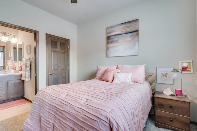1325 Hagar St, La Crosse, WI 54603 - bedroom featuring light colored carpet and connected bathroom