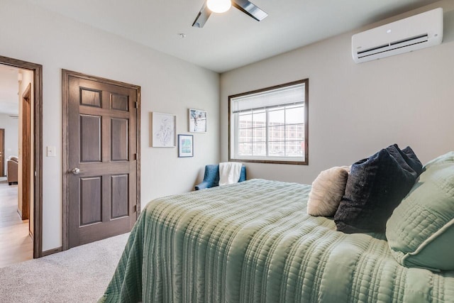 1325 Hagar St, La Crosse, WI 54603 - carpeted bedroom with a wall unit AC and a ceiling fan