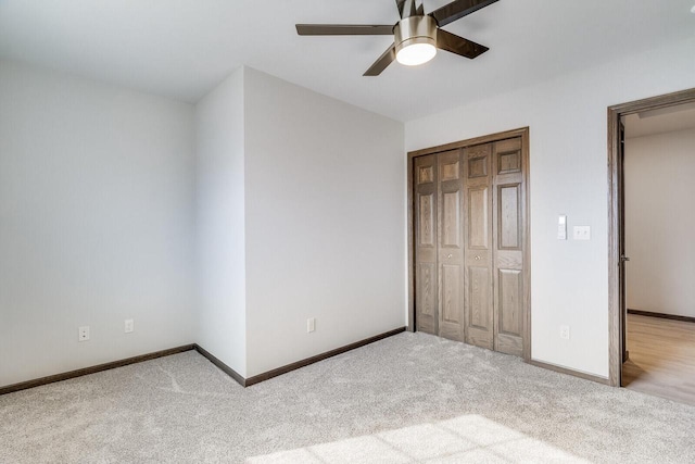 1325 Hagar St, La Crosse, WI 54603 - unfurnished bedroom with carpet flooring, baseboards, a closet, and ceiling fan