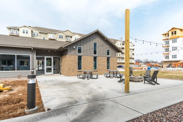 1325 Hagar St, La Crosse, WI 54603 - view of property's community with an outdoor fire pit and a patio area