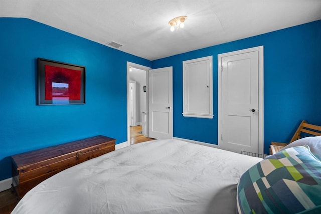 841 4th St S, Wisconsin Rapids, WI 54494 - bedroom featuring baseboards and wood finished floors
