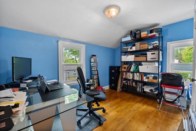 841 4th St S, Wisconsin Rapids, WI 54494 - office space with hardwood / wood-style floors and vaulted ceiling