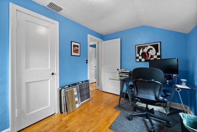 841 4th St S, Wisconsin Rapids, WI 54494 - home office featuring light wood-type flooring and lofted ceiling