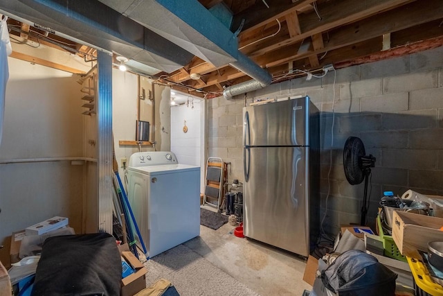 841 4th St S, Wisconsin Rapids, WI 54494 - unfinished basement featuring freestanding refrigerator, washer / dryer, and concrete block wall