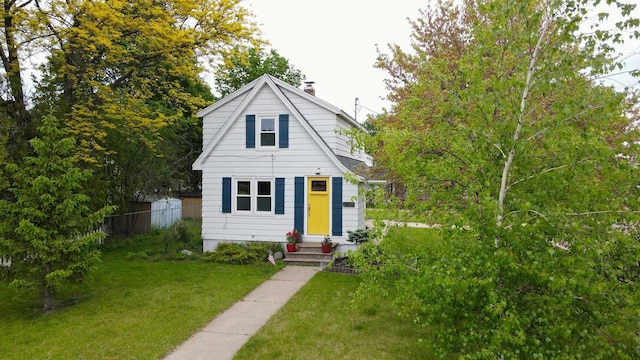 841 4th St S, Wisconsin Rapids, WI 54494 - bungalow-style home with a chimney and entry steps