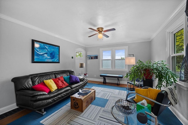 841 4th St S, Wisconsin Rapids, WI 54494 - living room with baseboards, wood finished floors, a ceiling fan, and crown molding