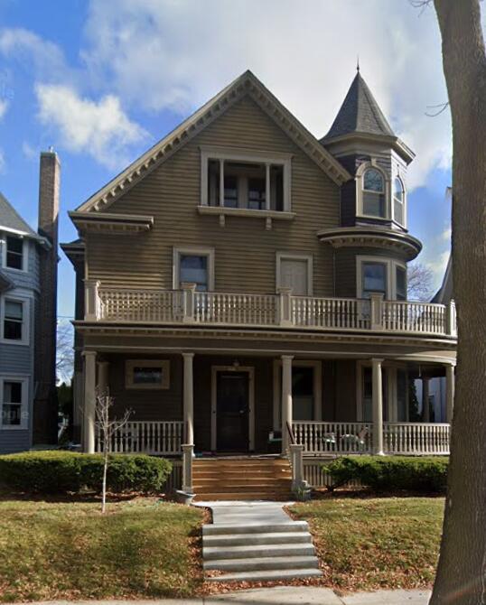2710 N Hackett Ave, Milwaukee, WI 53211 - victorian house with a porch and a balcony