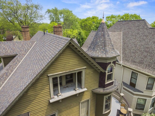 2710 N Hackett Ave, Milwaukee, WI 53211 - exterior view of a chimney and roof with shingles
