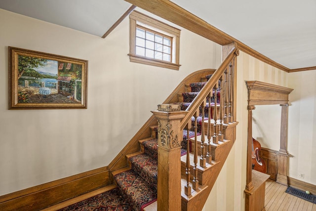 2710 N Hackett Ave, Milwaukee, WI 53211 - stairway featuring crown molding and baseboards
