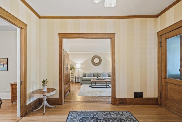2710 N Hackett Ave, Milwaukee, WI 53211 - hallway featuring ornamental molding, hardwood / wood-style floors, and wallpapered walls