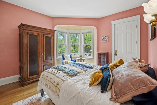 2710 N Hackett Ave, Milwaukee, WI 53211 - bedroom with light wood-type flooring and baseboards