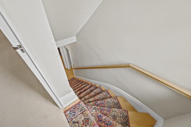 2710 N Hackett Ave, Milwaukee, WI 53211 - stairs featuring baseboards and wood finished floors