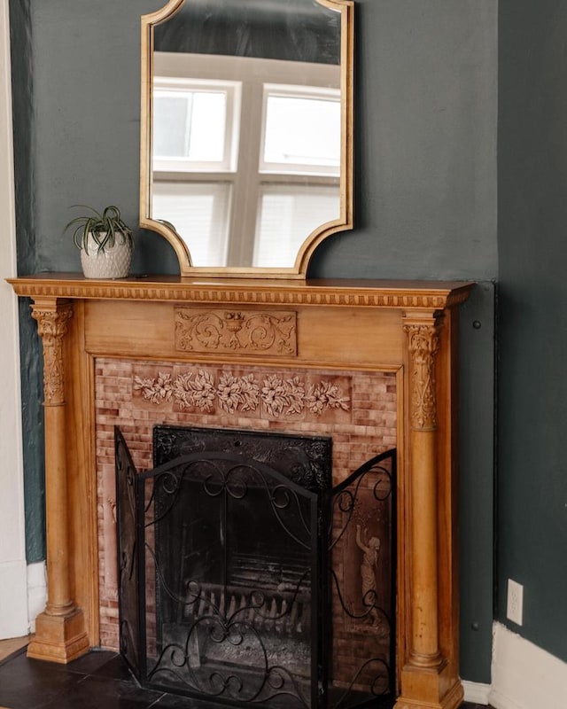 2710 N Hackett Ave, Milwaukee, WI 53211 - detailed view of a tile fireplace