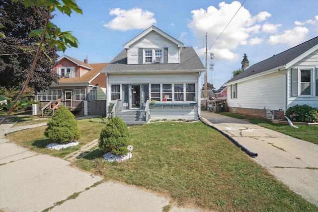 517 Shelley Dr, Racine, WI 53405 - view of front of house featuring a porch and a front lawn