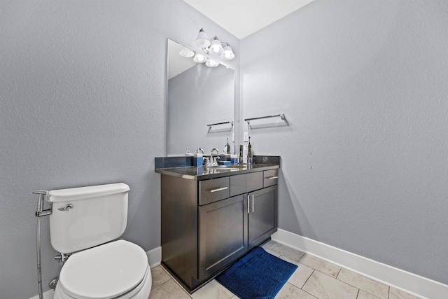 19750 Heron Pass, Brookfield, WI 53045 - bathroom with vanity, toilet, baseboards, and tile patterned floors