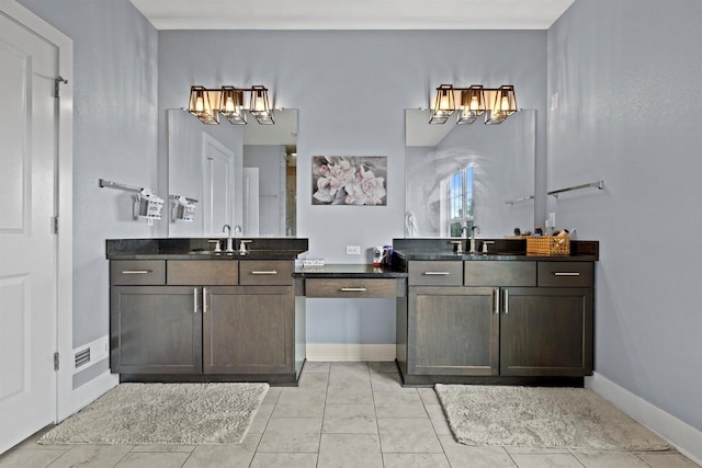 19750 Heron Pass, Brookfield, WI 53045 - bathroom featuring two vanities and baseboards