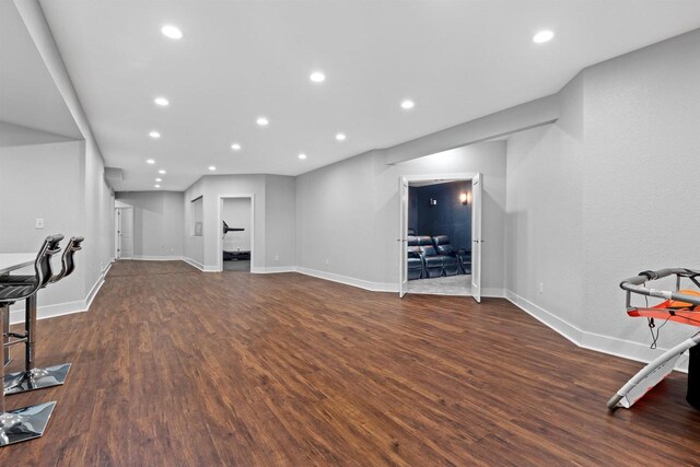 19750 Heron Pass, Brookfield, WI 53045 - unfurnished living room with wood finished floors, baseboards, and recessed lighting