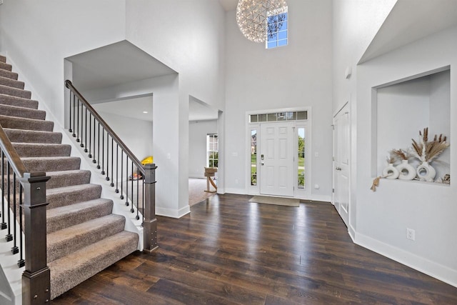 19750 Heron Pass, Brookfield, WI 53045 - entryway featuring stairs, wood finished floors, baseboards, a chandelier, and a towering ceiling