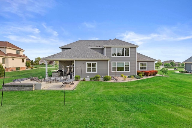 19750 Heron Pass, Brookfield, WI 53045 - rear view of property featuring a patio, a yard, and a shingled roof