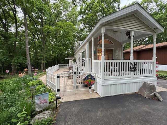 269 Oak Ln, Edgerton, WI 53534 - view of home's exterior with a porch and ceiling fan