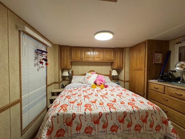 269 Oak Ln, Edgerton, WI 53534 - bedroom featuring wooden walls