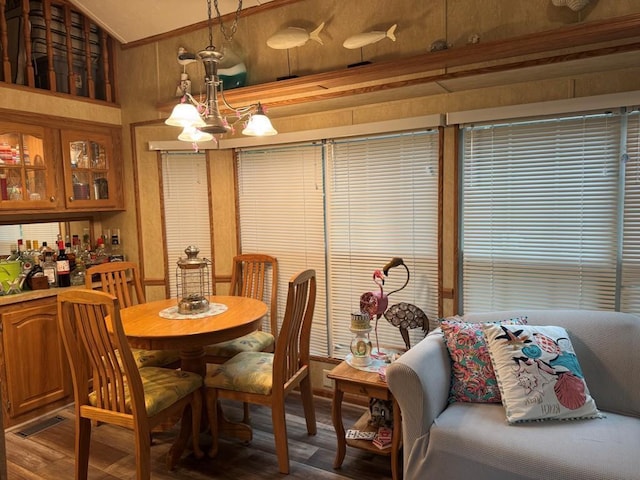269 Oak Ln, Edgerton, WI 53534 - dining room featuring lofted ceiling and wood finished floors
