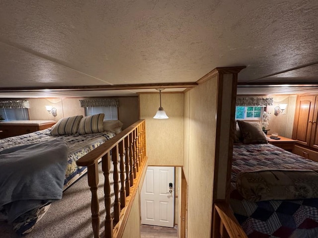269 Oak Ln, Edgerton, WI 53534 - bedroom with a textured ceiling and a textured wall