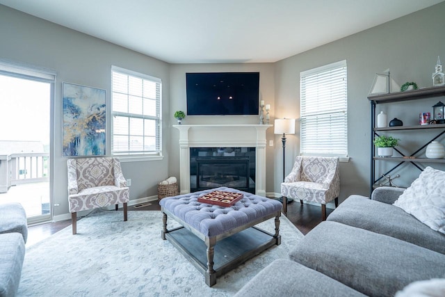 7236 N Beau Ave, Milwaukee, WI 53224 - living area featuring a glass covered fireplace and wood finished floors