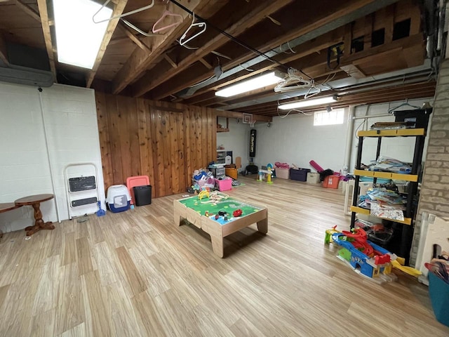 1522 Barlow St, La Crosse, WI 54601 - below grade area featuring heating unit and wood finished floors