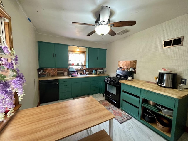1522 Barlow St, La Crosse, WI 54601 - kitchen with green cabinets, black appliances, ceiling fan, and tasteful backsplash