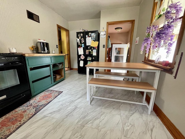 1522 Barlow St, La Crosse, WI 54601 - dining area with light marble finish floors and baseboards