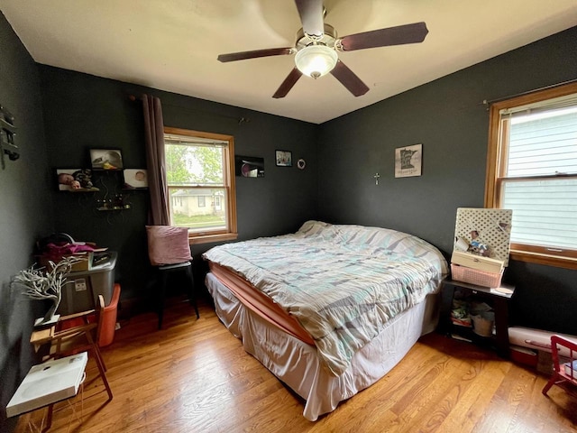 1522 Barlow St, La Crosse, WI 54601 - bedroom with light wood-type flooring, lofted ceiling, and ceiling fan