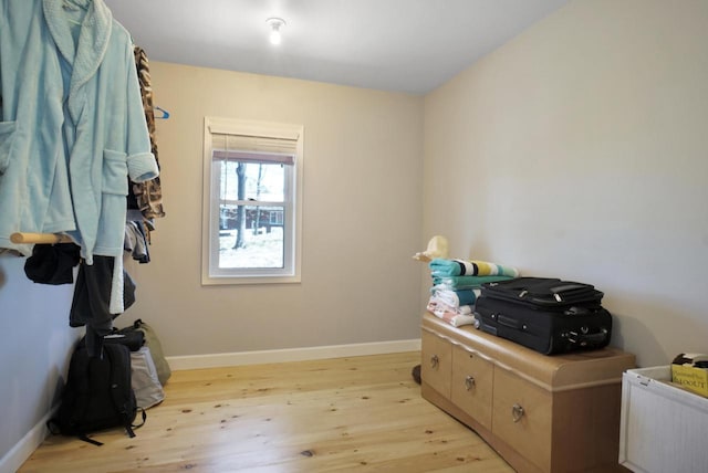 1014 Long Bow Ct, Nekoosa, WI 54457 - misc room with light wood finished floors and baseboards