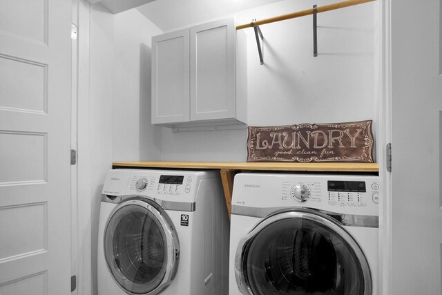 1014 Long Bow Ct, Nekoosa, WI 54457 - laundry room featuring cabinet space and washer and clothes dryer